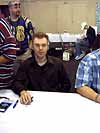 BotCon 2004: Dreamwave Crew - Transformers Event: Adam Patyk signing autographs